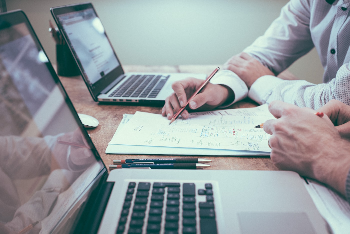 Before/after visual: fragmented tools (spreadsheets, email, paper files) versus a unified HR dashboard across locations. Professional, formal tone.